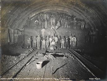 (BOSTON TRANSIT COMMISSION) An album with 23 photographs depicting construction of the Boston subway system,